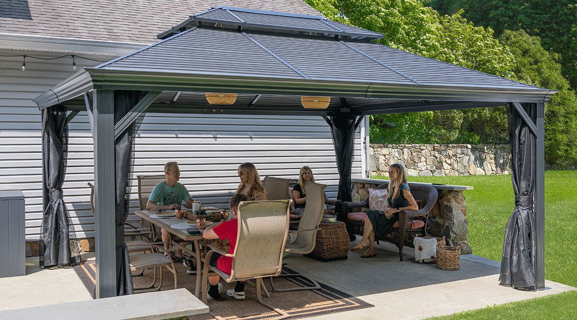 Gathering underneath a patio gazebo