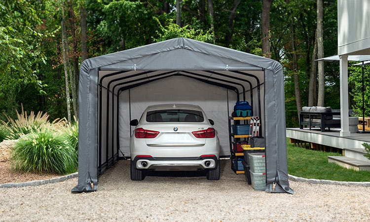 White Vehicle in a Gray Garage