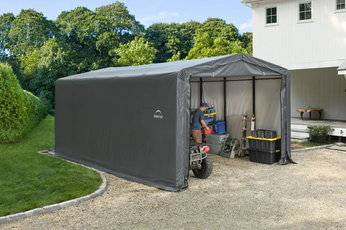 ShelterLogic garage out in front of a house