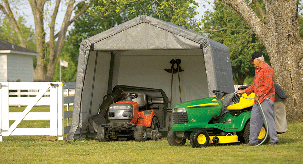 man outside a shed-in-a-box shed unit