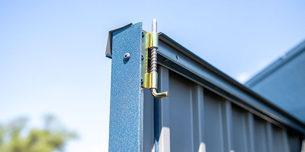 Assembling the doors of an Arrow Elite metal shed