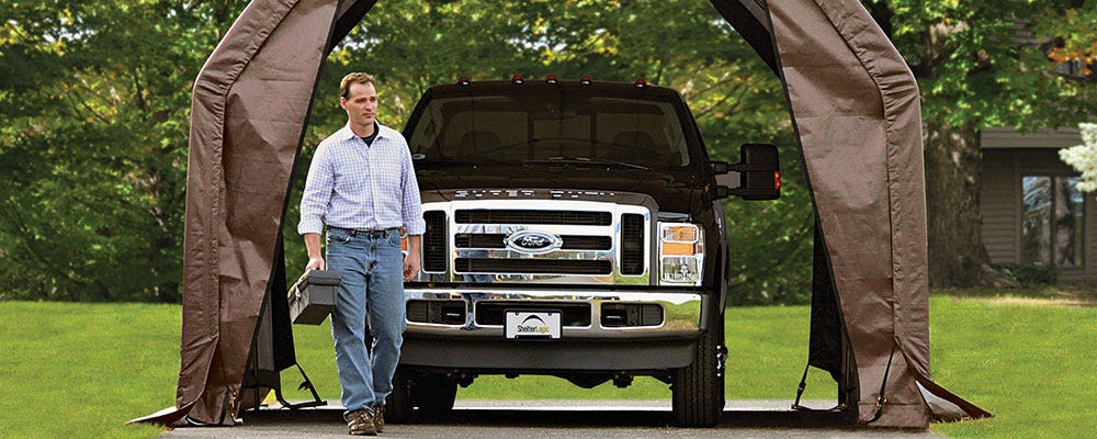 Truck in fabric garage