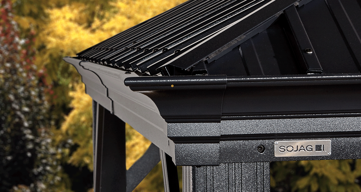 A closeup of a Sojag gazebo roof against a fall background